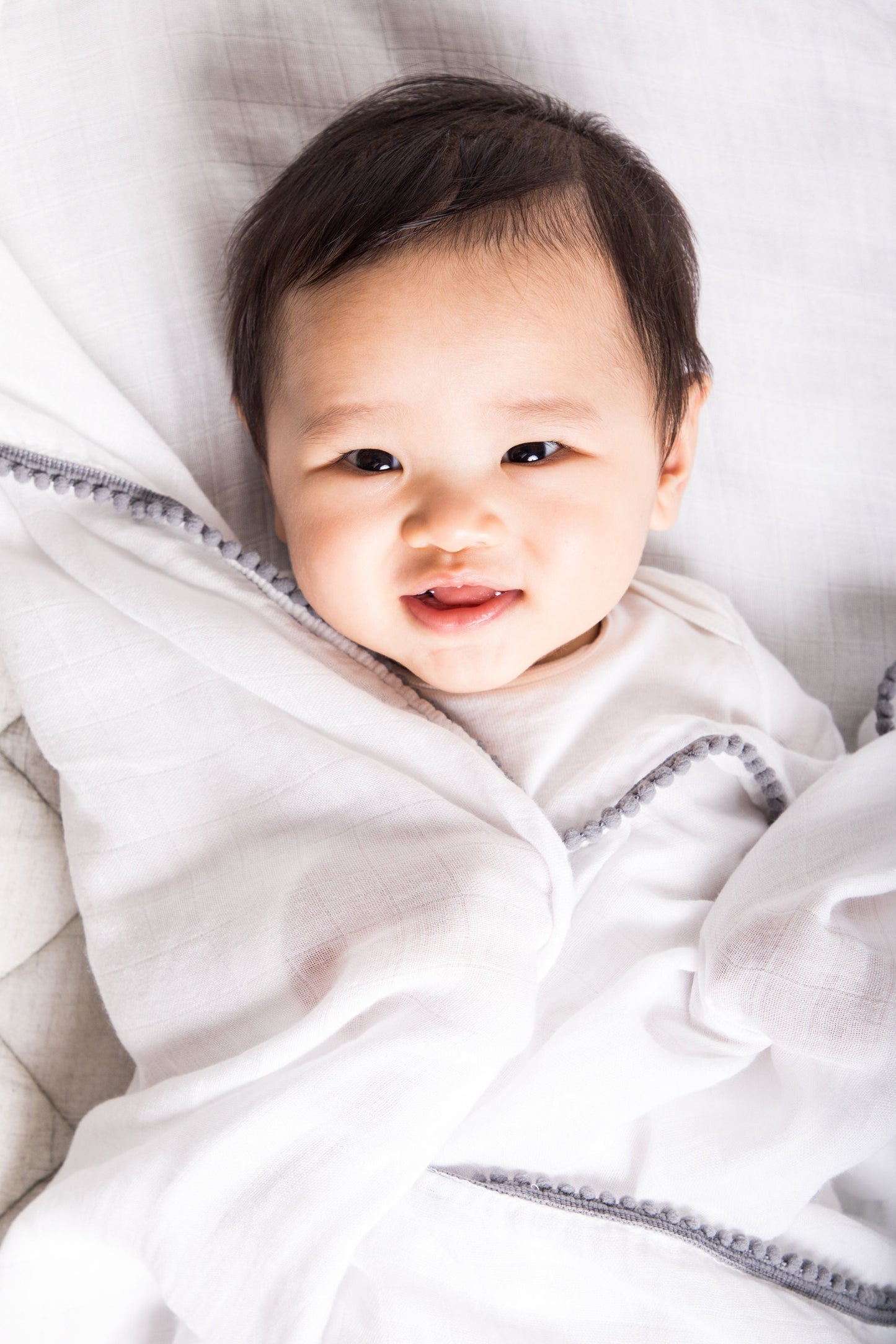 Organic Bamboo Pom Pom Swaddle